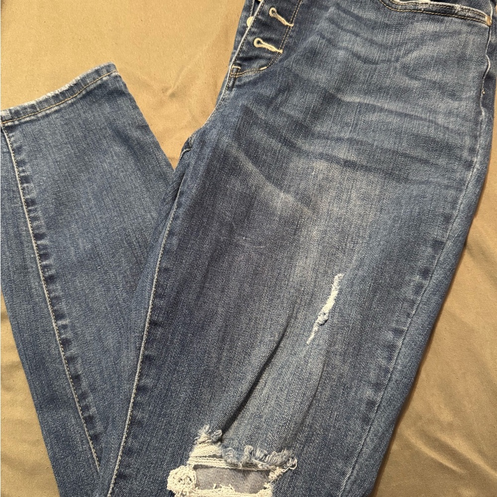 Judy Blue Skinny Blue Jeans Distressed knees and a button fly